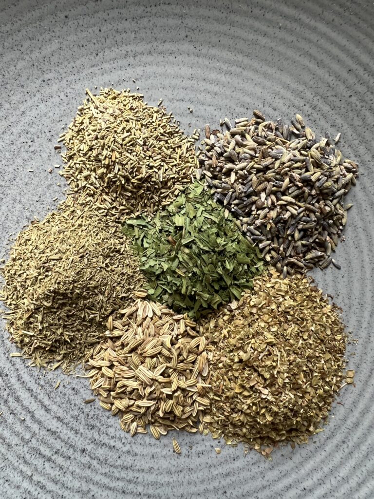 Ingredients for Herbes de Provence Blend. Rosemary, tarragon, thyme, oregano, and lavender.