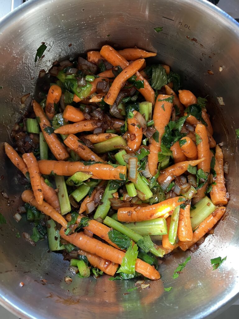 Pot of sauteed vegetables for Red Wine Braised Beef Stew.