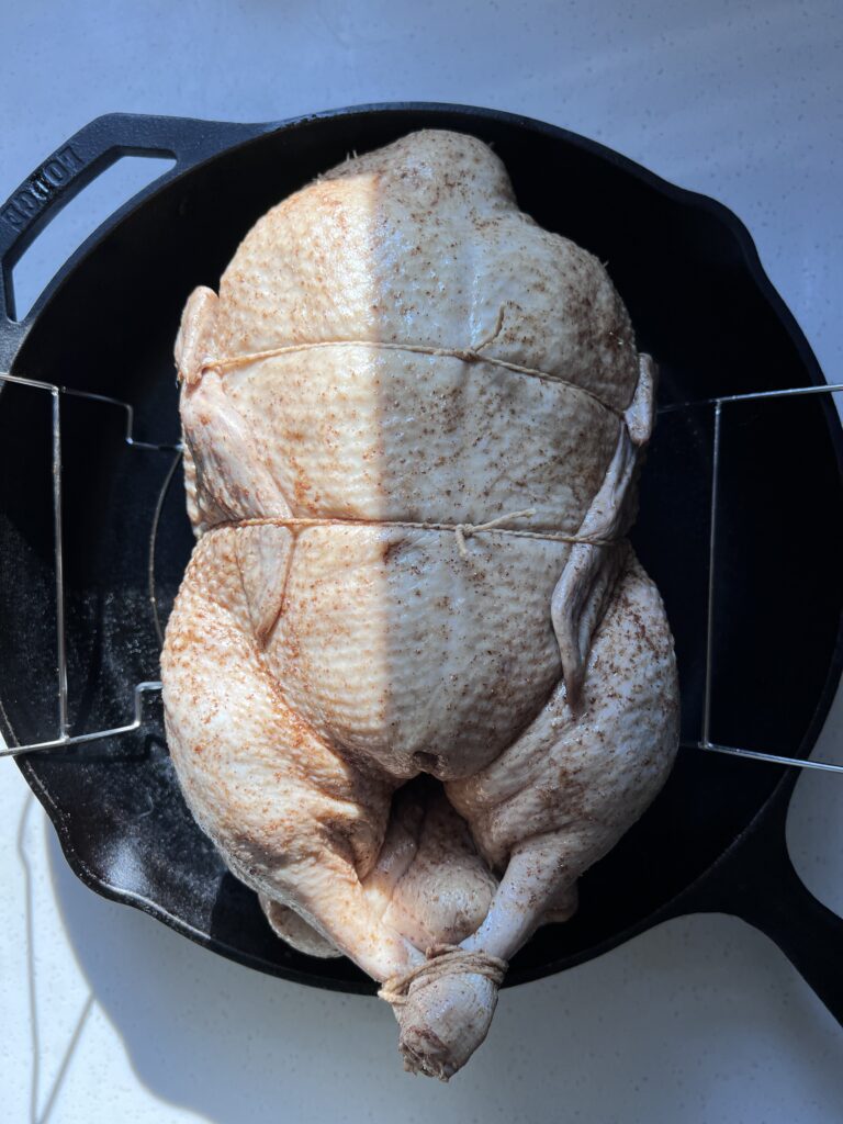 Example of how to tie duck wings and legs in a roasting pan.