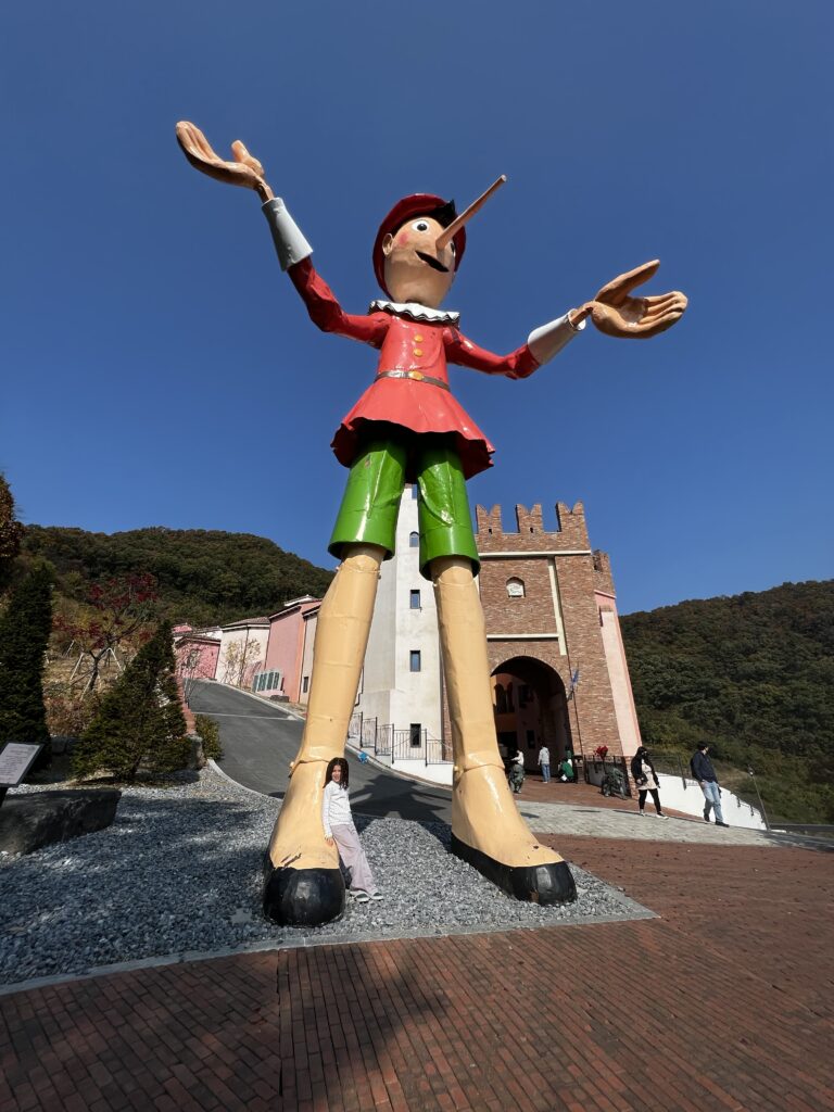 A Glimpse of Korea in autumn. Pinocchio statue in Italian Village.